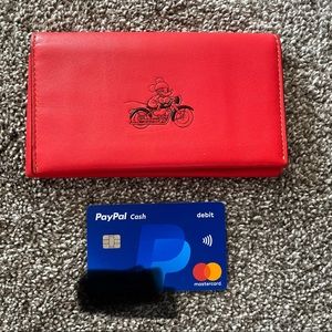 Coach x Disney Glovetanned Leather Phone Wallet “Mickey on Motorcycle.”